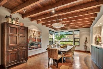 18595 Lomita Avenue Sonoma dining room with beamed ceilings dining room table chairs and armoire 
