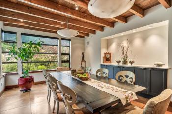 18595 Lomita Avenue Sonoma eating area with table chairs beamed ceilings slated window